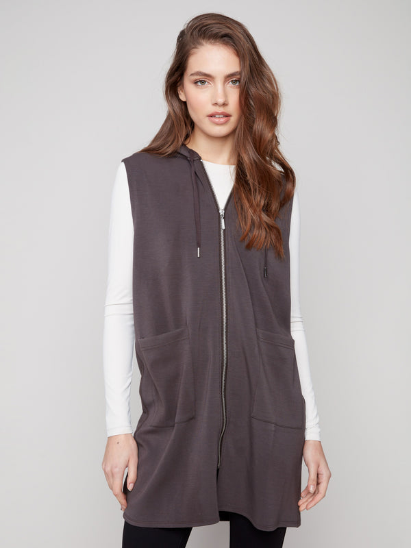 Stylish mocha vest with convenient front patch pockets and sleek zip closure by Charlie B.