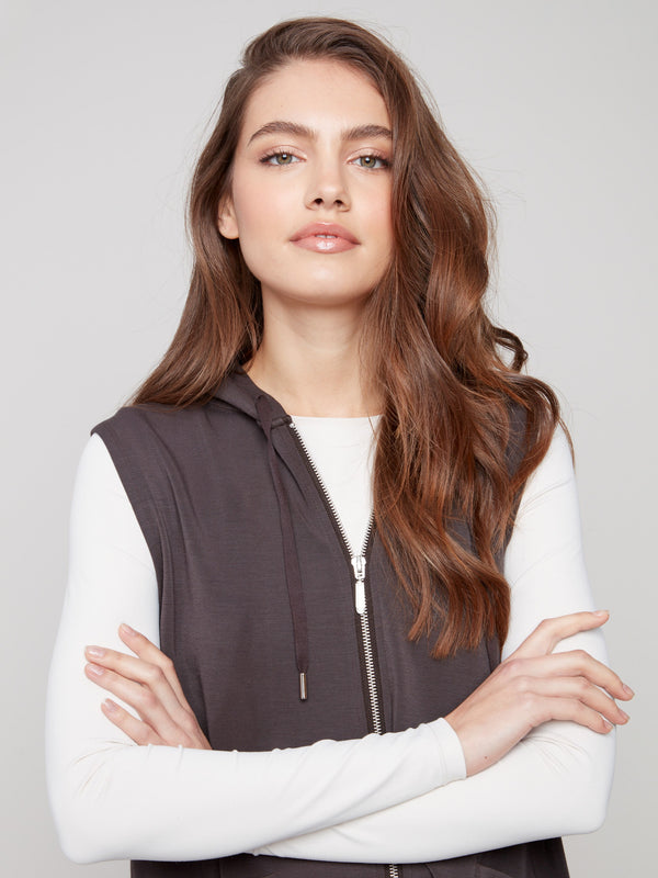 Elegant mocha vest designed with a cozy hood and drawstrings, perfect for layering by Charlie B.