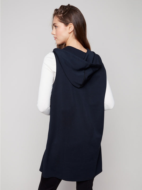 Fashionable black long vest designed with an attached hood and practical zip closure by Charlie B.