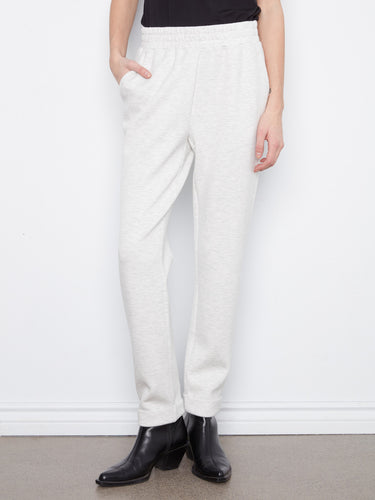 These jogger pants in heather-light grey offer a comfortable stretch fabric and stylish design by Charlie B.