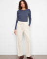 Wide leg pants feature a comfortable elastic waistband with drawstring, perfect for casual wear by Charlie B.