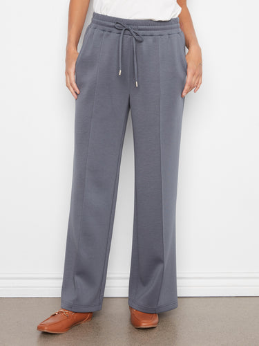 The full-length cut of these pants offers elegance and versatility for any occasion by Charlie B.
