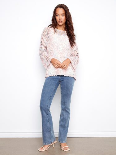 Designed with drop shoulders, this top provides a relaxed fit that combines fashion and comfort effortlessly by Charlie B.