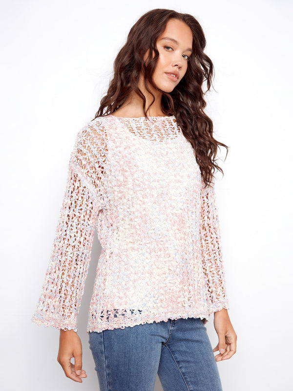 With chic 3/4 sleeves, this versatile piece is ideal for transitioning between seasons in style and grace by Charlie B.