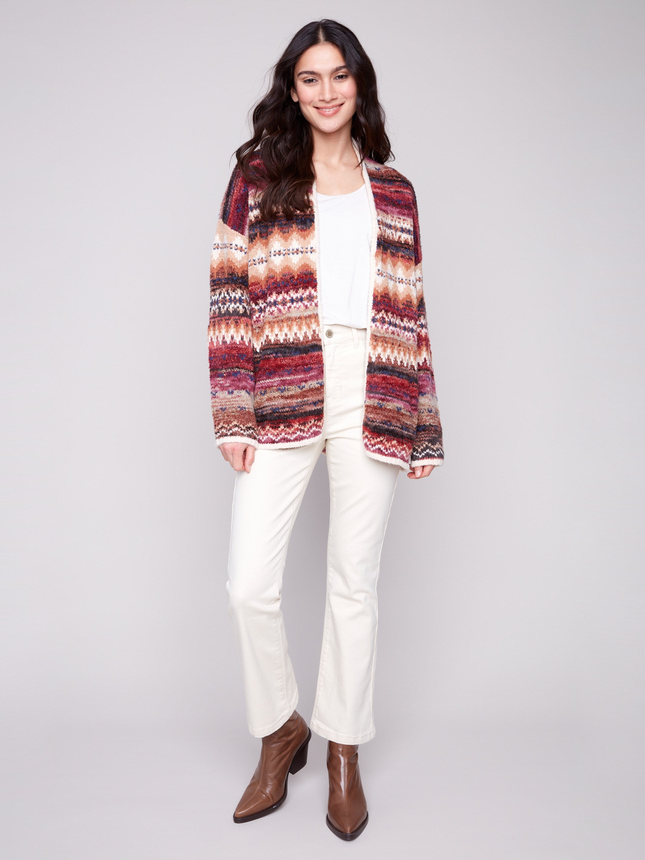 Space Dye Jacquard Cardigan features drop shoulders and a geometric pattern in jewel tones by Charlie B.