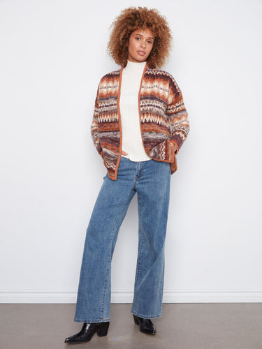 Open front design offers layering versatility in this eye-catching knitwear by Charlie B.