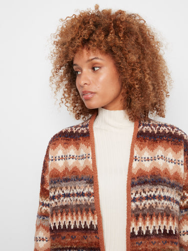 Rich textures and colors combine in this long-sleeved essential for cooler days. By Charlie B.