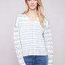 Women's sweater featuring a V-neck design in a space dye pattern with drop shoulders for effortless style by Charlie B.
