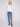 Stylish women's sweater with open knit sleeves and a striped pattern, showcasing drop shoulder detailing by Charlie B.