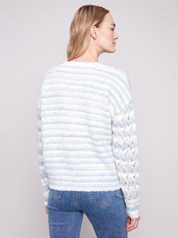 Elegant space dye sweater for women, highlighting stylish drop shoulders and soft striped texture by Charlie B.