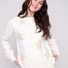 White sweater adorned with subtle metallic stars, offering a cozy plush knit texture for added comfort by Charlie B.
