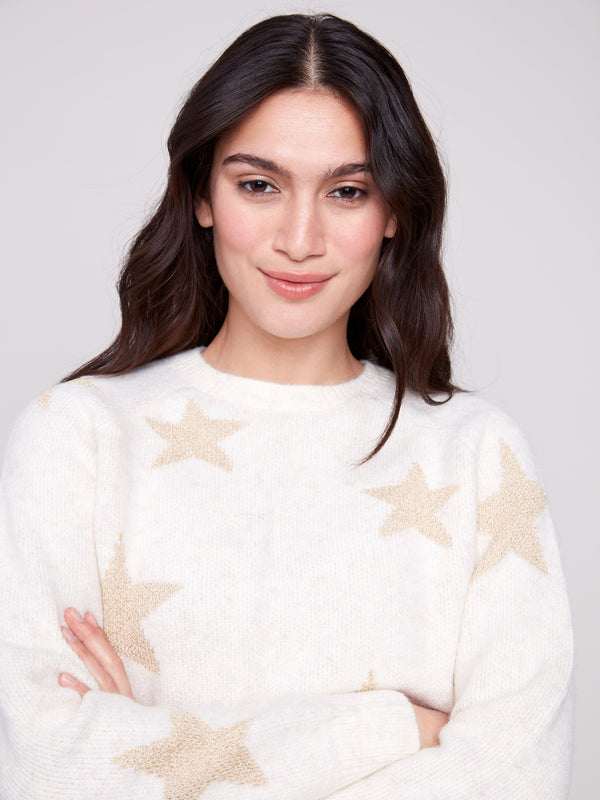 Soft white sweater featuring a classic crew neck and delicate star accents, ideal for any casual outing by Charlie B.