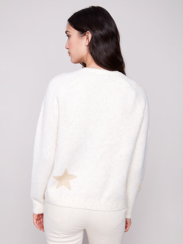 Chic white sweater with plush knit fabric and shimmering star details, providing warmth and style by Charlie B.