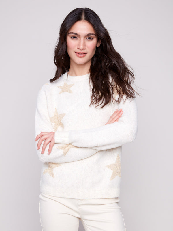 Stylish white sweater with long raglan sleeves and subtle metallic stars for an understated elegance by Charlie B.