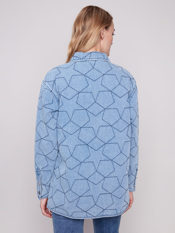 The jacket includes two practical welt pockets, adding functionality to its trendy design by Charlie B.