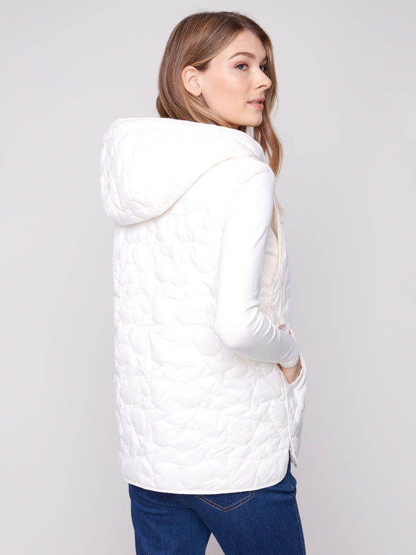 Elegant ecru vest adorned with quilted stars, includes welt pockets and a functional zipper front by Charlie B.