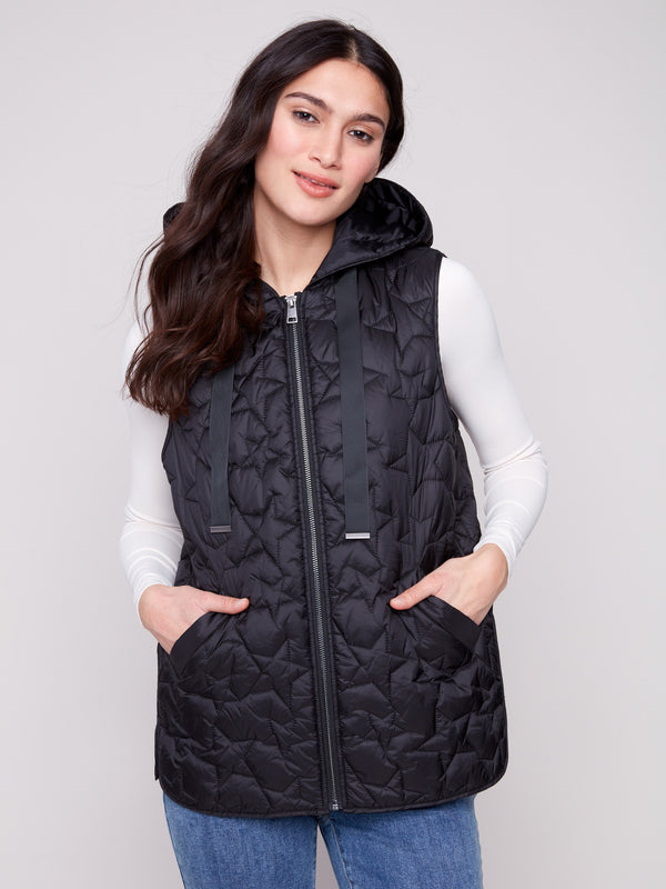 Black vest with hood and drawstrings, featuring quilted stars and welt pockets, perfect for layering by Charlie B.
