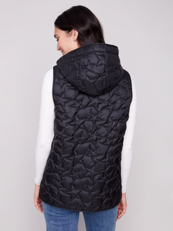 Stylish black vest highlighting quilted star design, equipped with a cozy hood for added comfort by Charlie B.