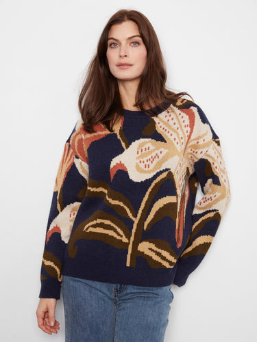 Navy blue sweater with abstract floral design, featuring a relaxed fit and ribbed cuffs for comfort by Charlie B.