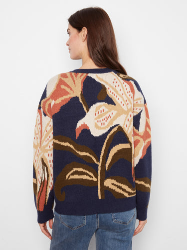 Contemporary navy sweater featuring long sleeves and an artistic floral pattern in earthy hues for versatile styling by Charlie B.