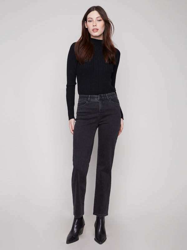 Designed with an elastic inside waistband, these charcoal jeans provide ease of movement by Charlie B.