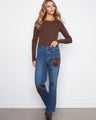 These regular rise jeans offer comfort and style with their unique heart patch details on the legs. By Charlie B.