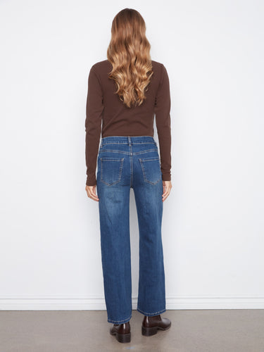 Classic denim style meets modern charm in these five-pocket jeans adorned with heart-shaped accents. By Charlie B.
