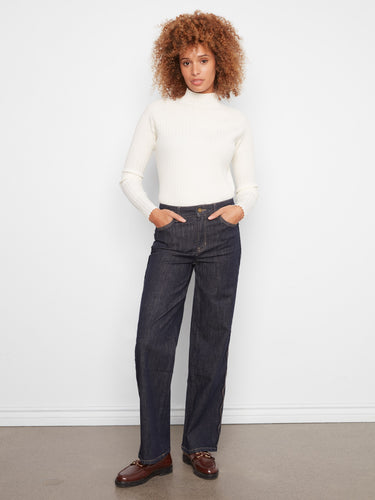 These jeans feature a straight leg design, offering a classic fit that pairs well with any top. By Charlie B.