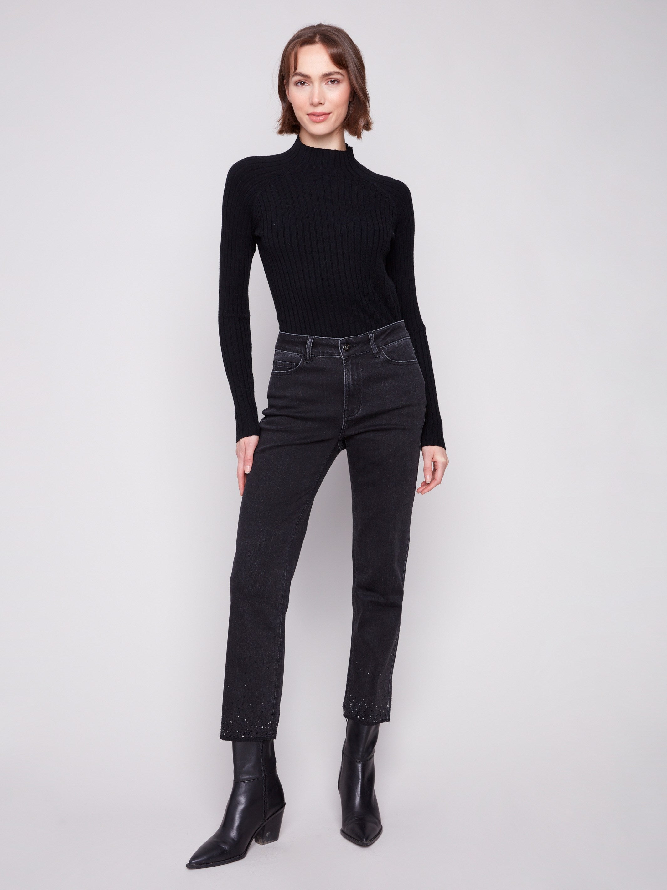 Black jeans with a straight fit, featuring sparkling rhinestones at the hem for a touch of glamour by Charlie B.