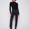 Black jeans with a straight fit, featuring sparkling rhinestones at the hem for a touch of glamour by Charlie B.