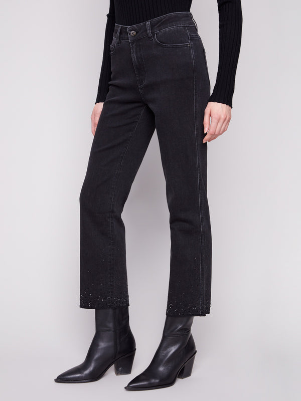 Long-length black jeans adorned with shimmering rhinestones at the hem, crafted for elegance by Charlie B.