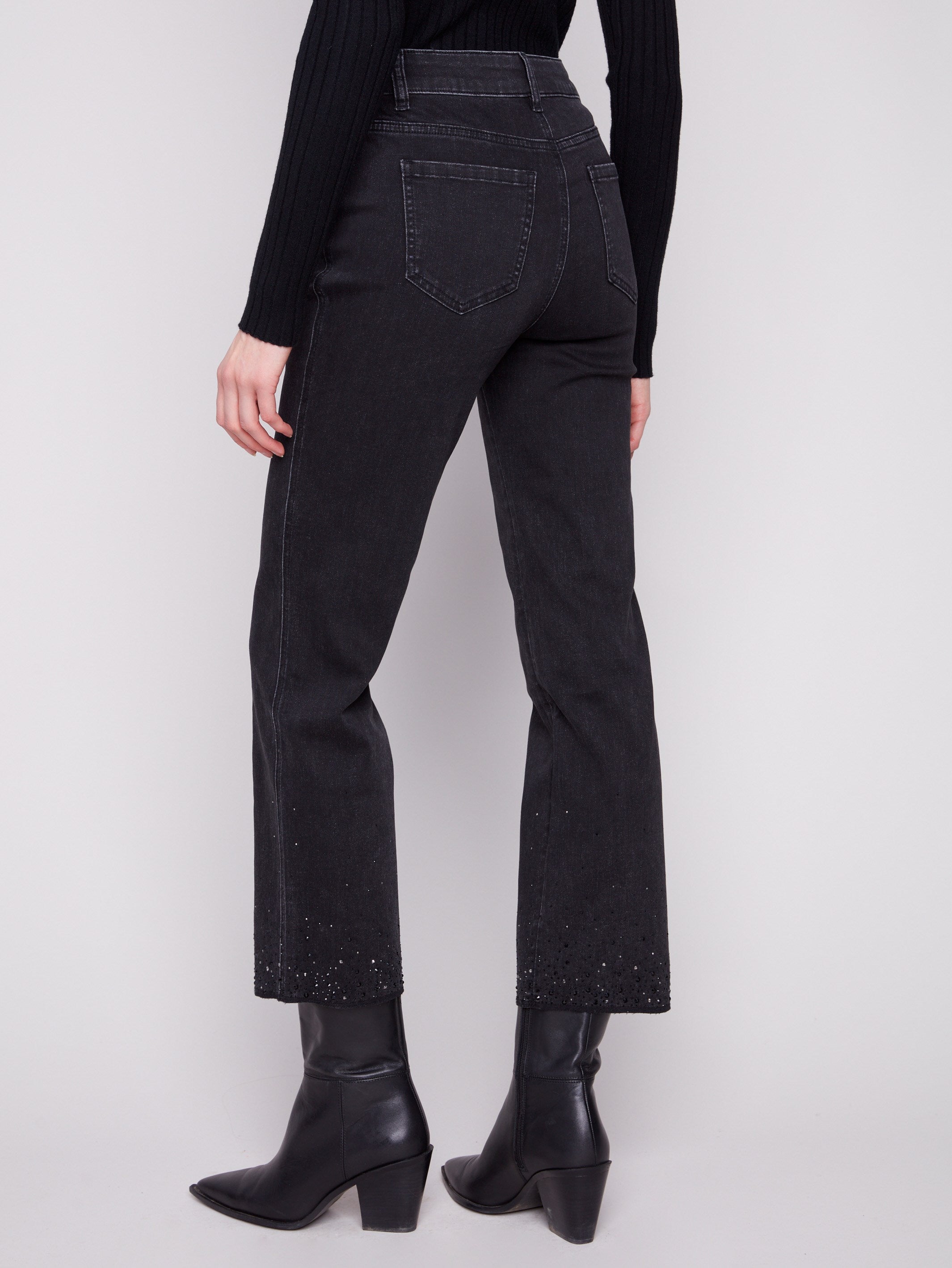 Featuring a regular rise and chic design, these black jeans offer both style and functionality by Charlie B.