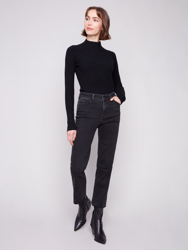 Embellished with rhinestones, these stylish black jeans offer a straight-leg cut for versatile wear by Charlie B.