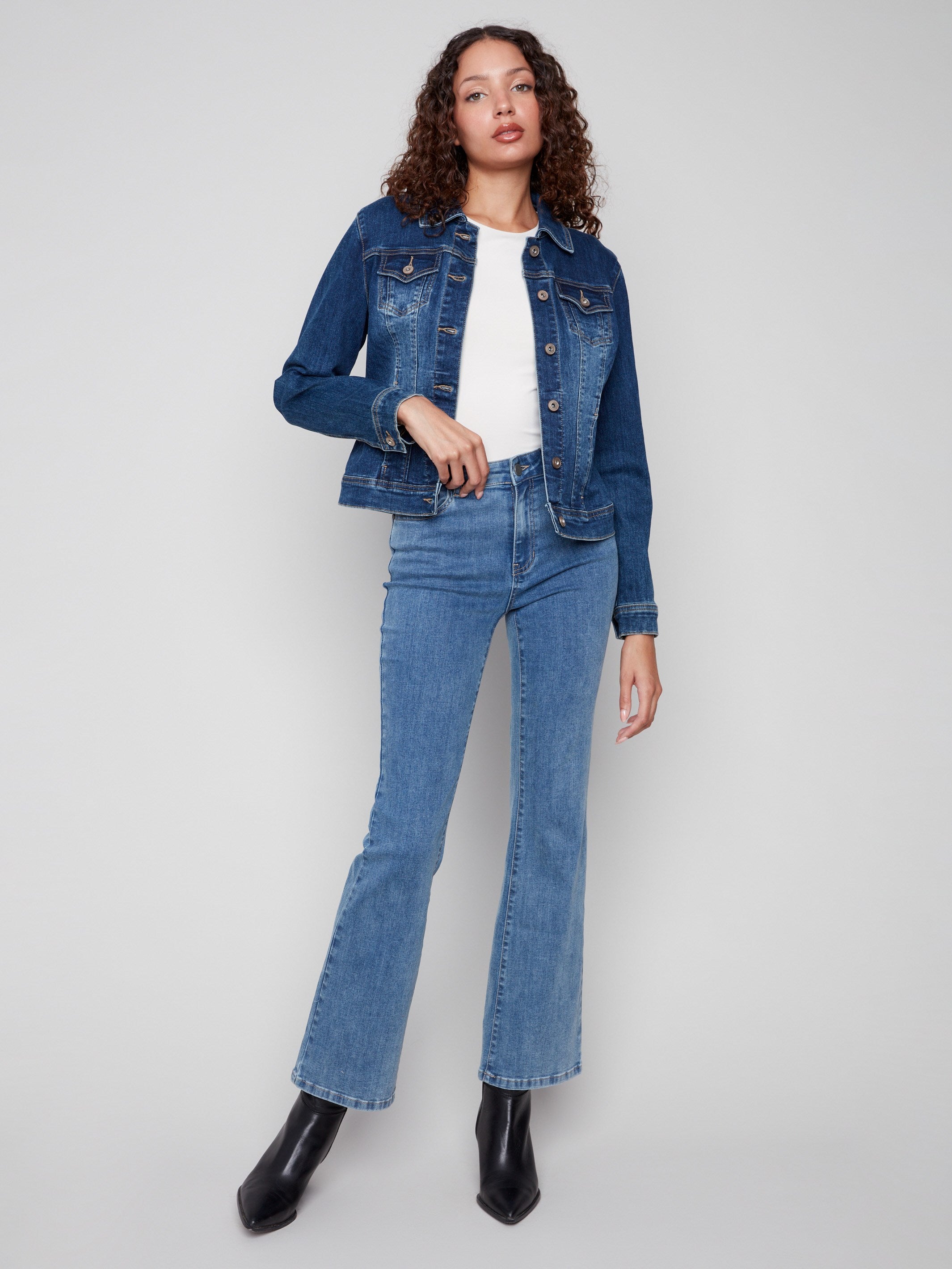 Indigo denim jacket featuring a spread collar and stylish design, perfect for casual wear by Charlie B.