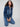 This indigo denim jacket offers a trendy button front, ideal for layering in any season by Charlie B.