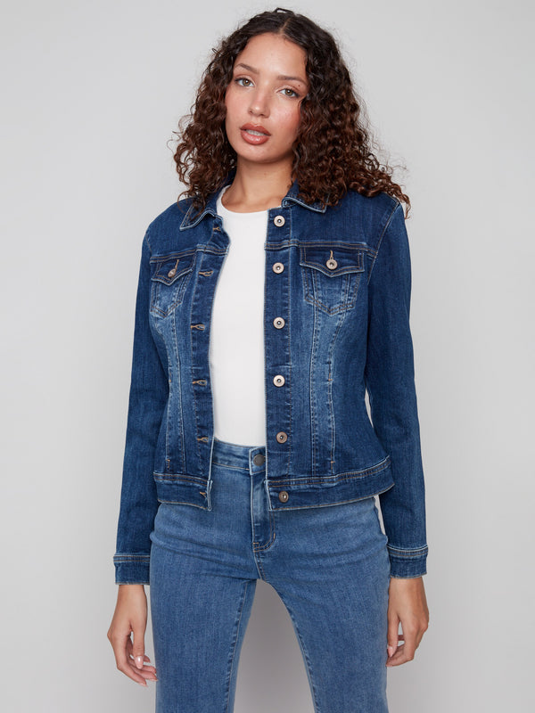 Indigo denim jacket with button front, flap pockets, and a classic collar by Charlie B.