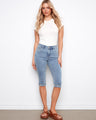 These stylish capri length jeans feature a flattering slim fit and regular rise. Perfect for any casual outing by Charlie B.