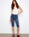Woman in indigo pedal pushers featuring a regular rise and slim fit, perfect for casual outings by Charlie B.