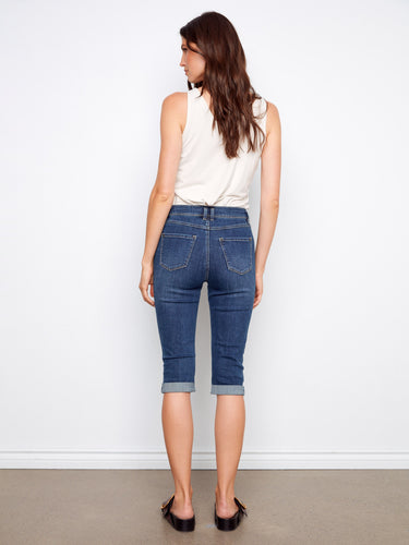 Showcasing stretch denim pedal pushers in indigo for comfort and ease of movement by Charlie B.