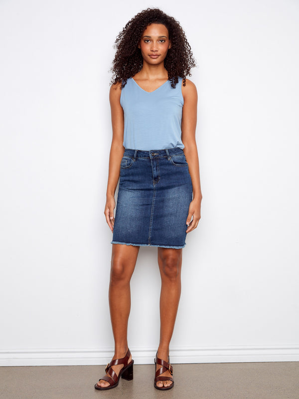 Denim skirt featuring a regular rise and classic five-pocket design, perfect for versatile styling by Charlie B.