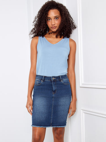 This denim skirt combines fashion and function with its practical five pockets for everyday convenience by Charlie B.