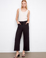 Black pants with a wide leg fit and cropped length, showcasing patch pockets. Designed for style and comfort by Charlie B.