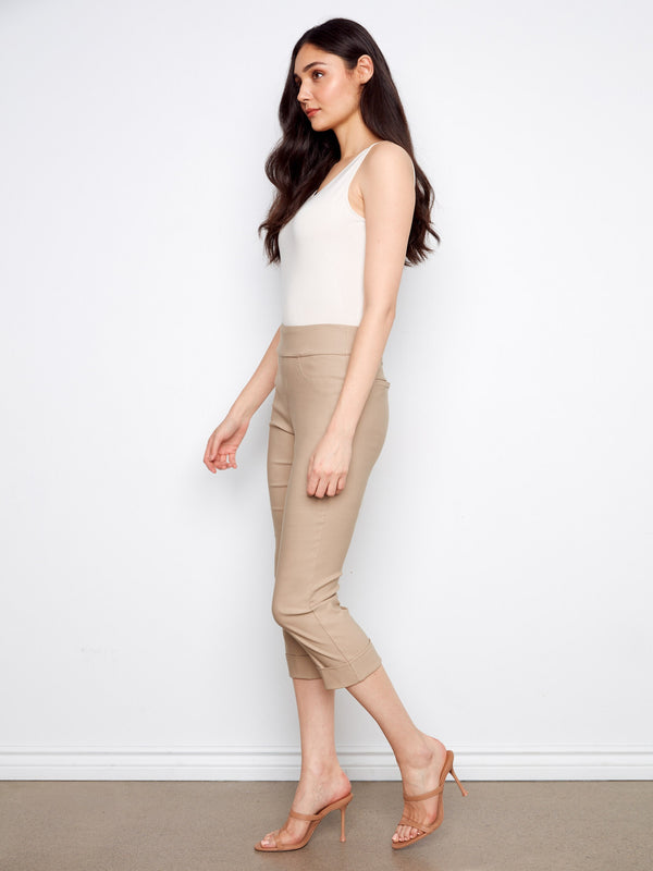 Featuring a stylish cuffed hem, these pants add a touch of sophistication to any outfit. Designed with care by Charlie B.
