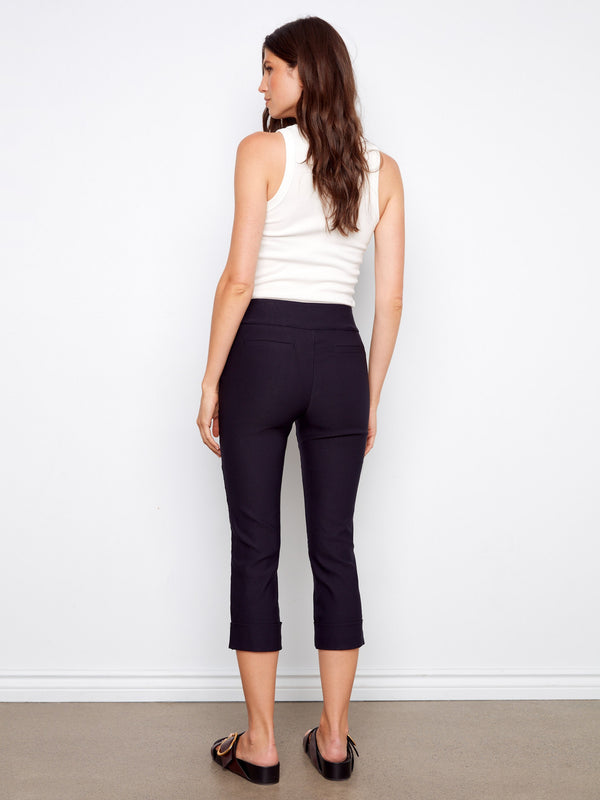 The cuffed hem adds a touch of sophistication to these versatile capri pants, suitable for any occasion. By Charlie B.