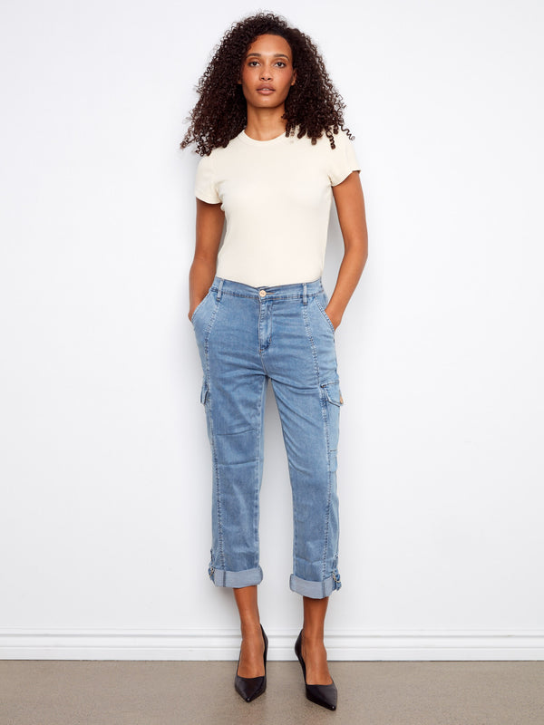 These jeans feature a relaxed fit and cropped length, perfect for casual comfort. The stretch fabric ensures easy movement by Charlie B.