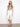 These stylish capri length pants in white are designed for both comfort and elegance by Charlie B.