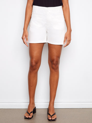 Stylish five-pocket design in these white shorts complements leisure activities on deck beautifully. By Charlie B.
