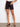 Featuring a five-pocket design, these black stretch twill shorts are stylish by Charlie B.