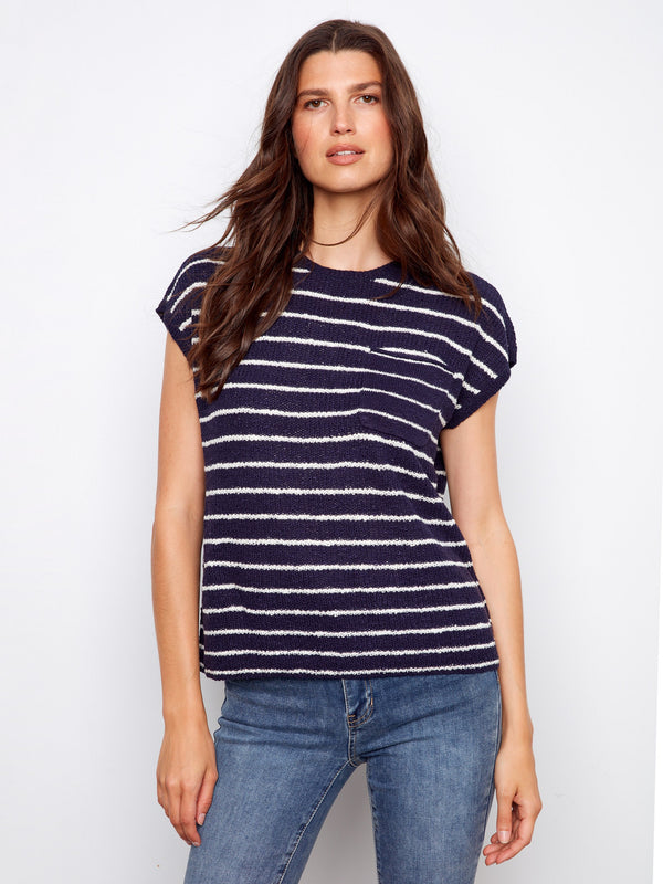 Striped navy and white top with a crew neckline, offering a stylish and comfortable look. Crafted from lightweight knit fabric by Charlie B.