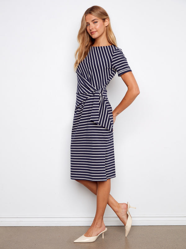 Elegant navy dress with cuffed sleeves and a stylish tie waist, perfect for any occasion by Charlie B.